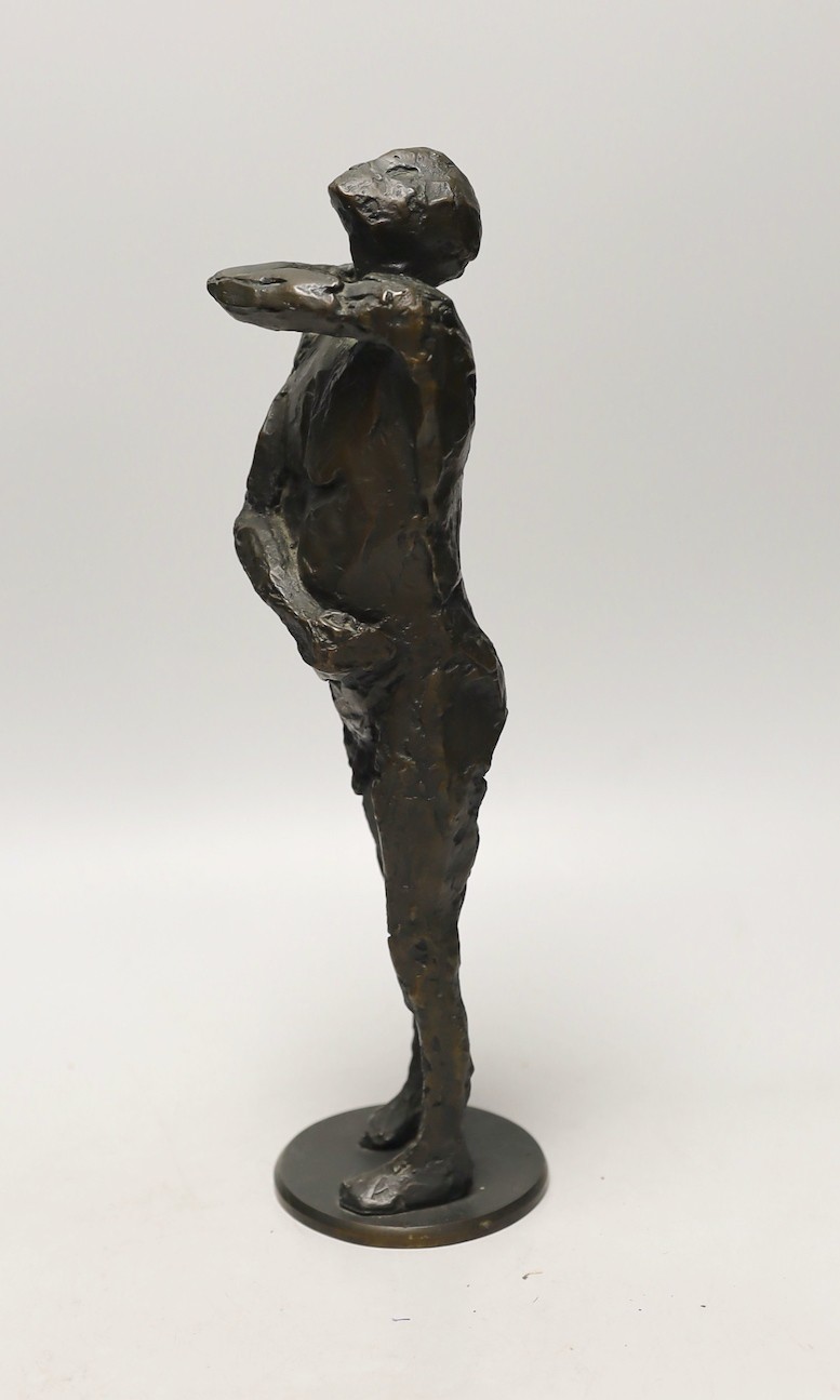 Bronze: pressed mark stamped to right ankle, one of nine, a figural male nude bronze, 35cms high